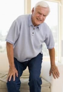 Older gentleman suffering from low back pain due to Arthritis